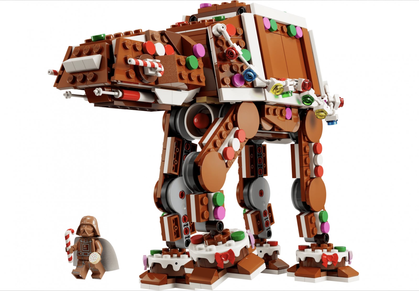 A classic LEGO Star Wars AT-AT reimagined as a gingerbread walker, accompanied by a festive Darth Vader minifigure.