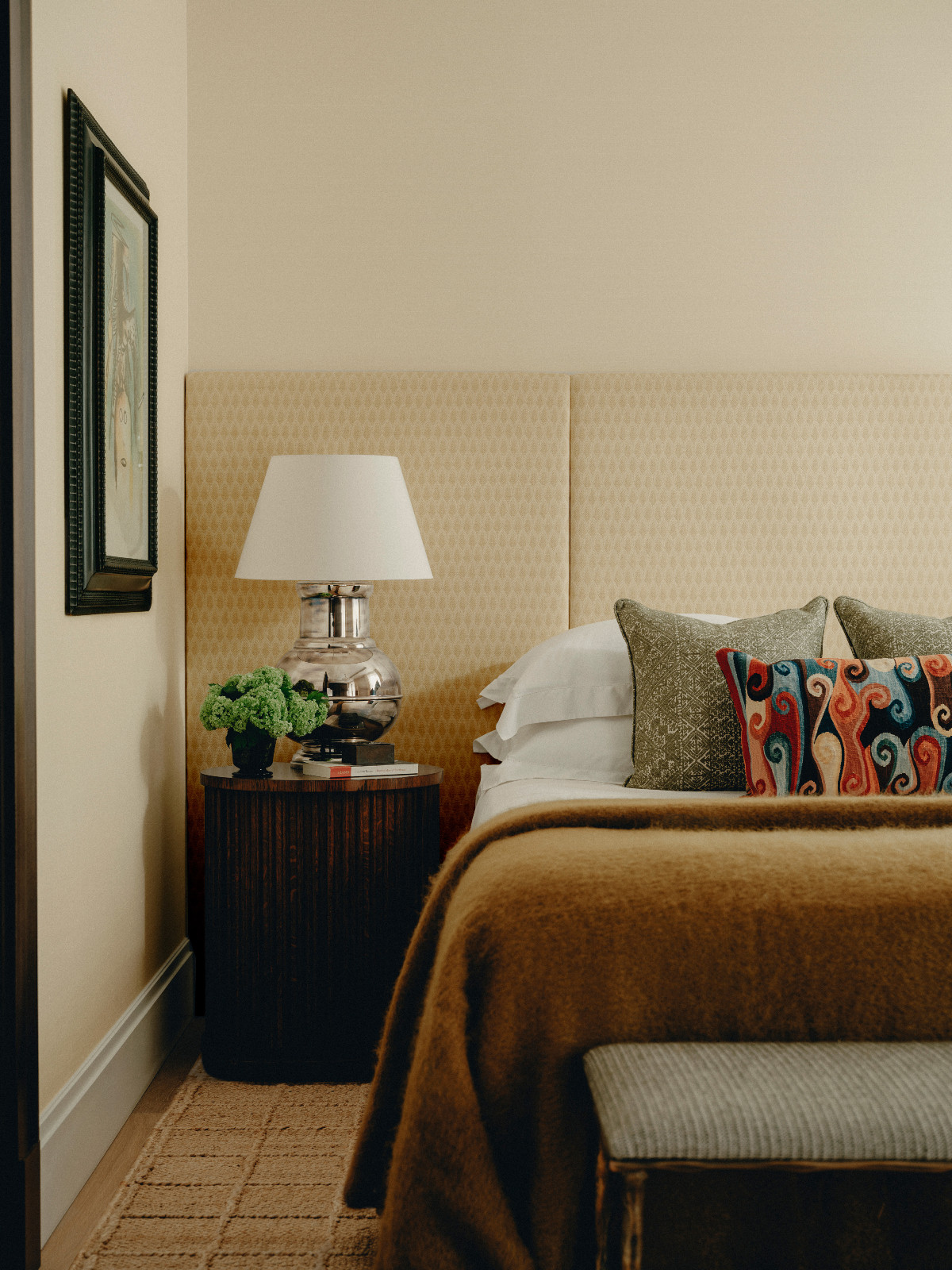 The bedroom of an art-filled Belgravia, London home designed by Studio Vero