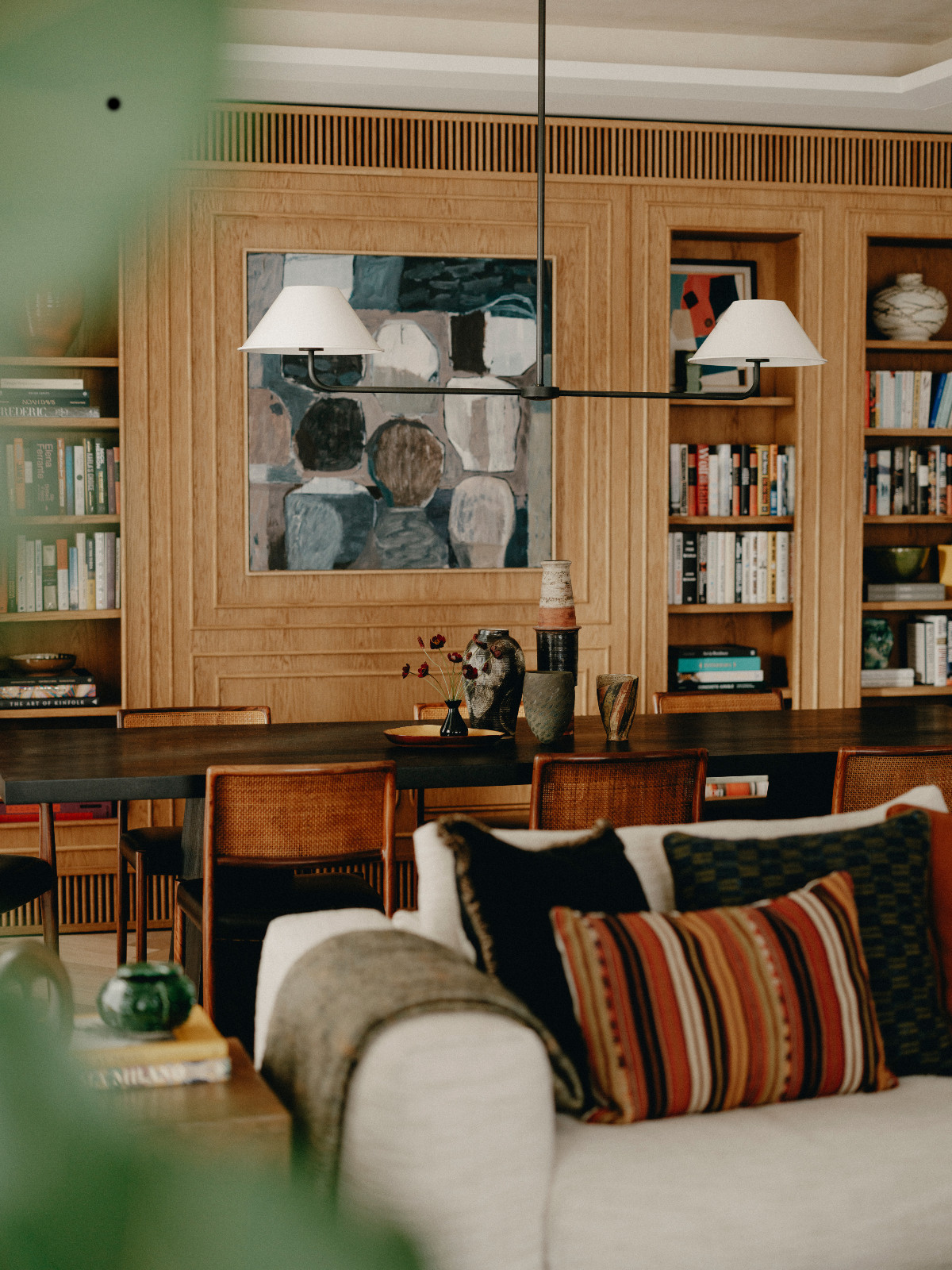 The living room and dining area of an art-filled Belgravia, London home designed by Studio Vero