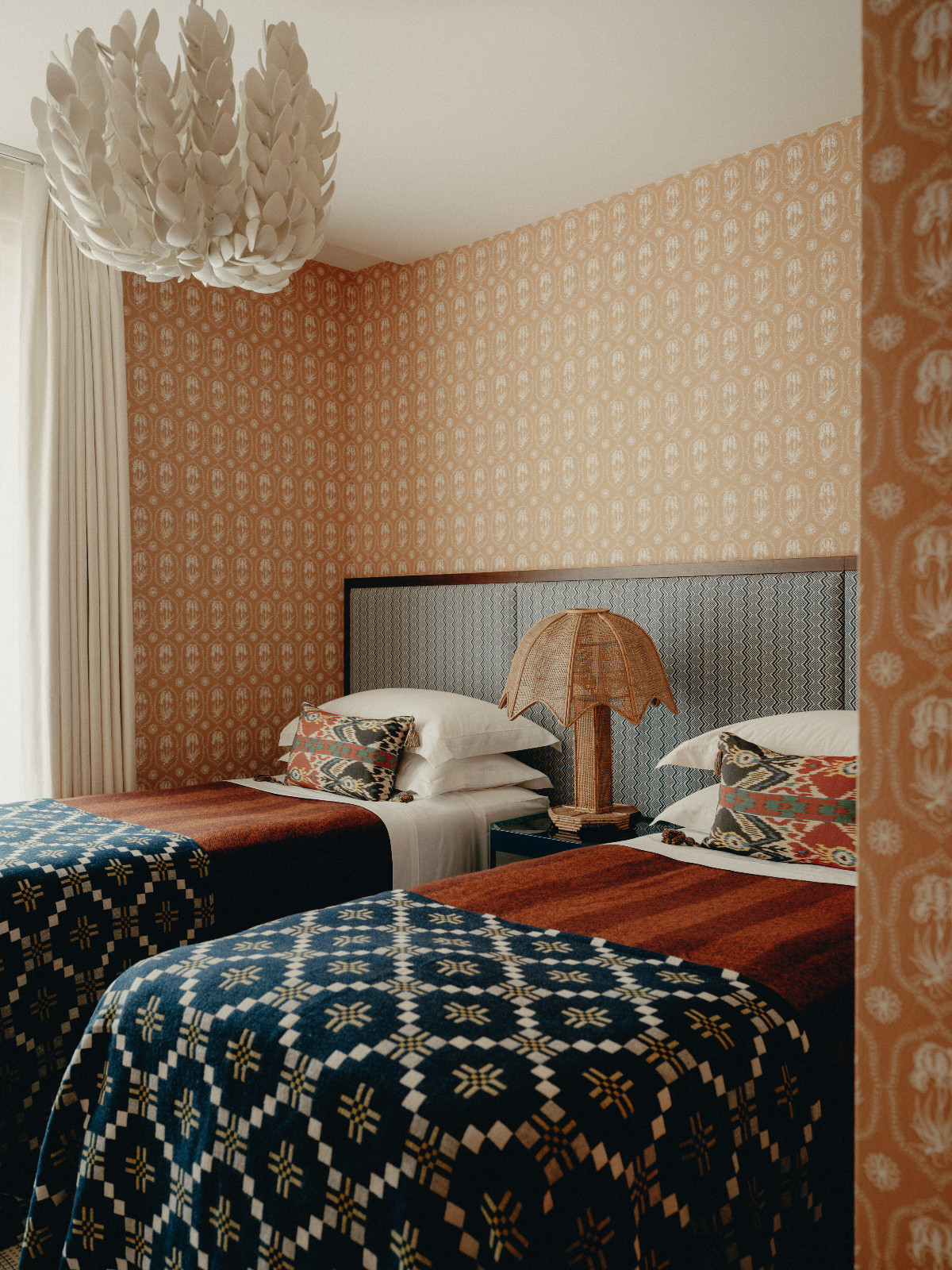 The secondary bedroom of an art-filled Belgravia, London home designed by Studio Vero
