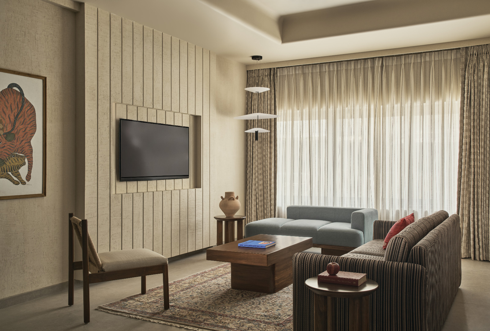 The living room in an Art Deco home by The Last Goldfish in Mumbai, India