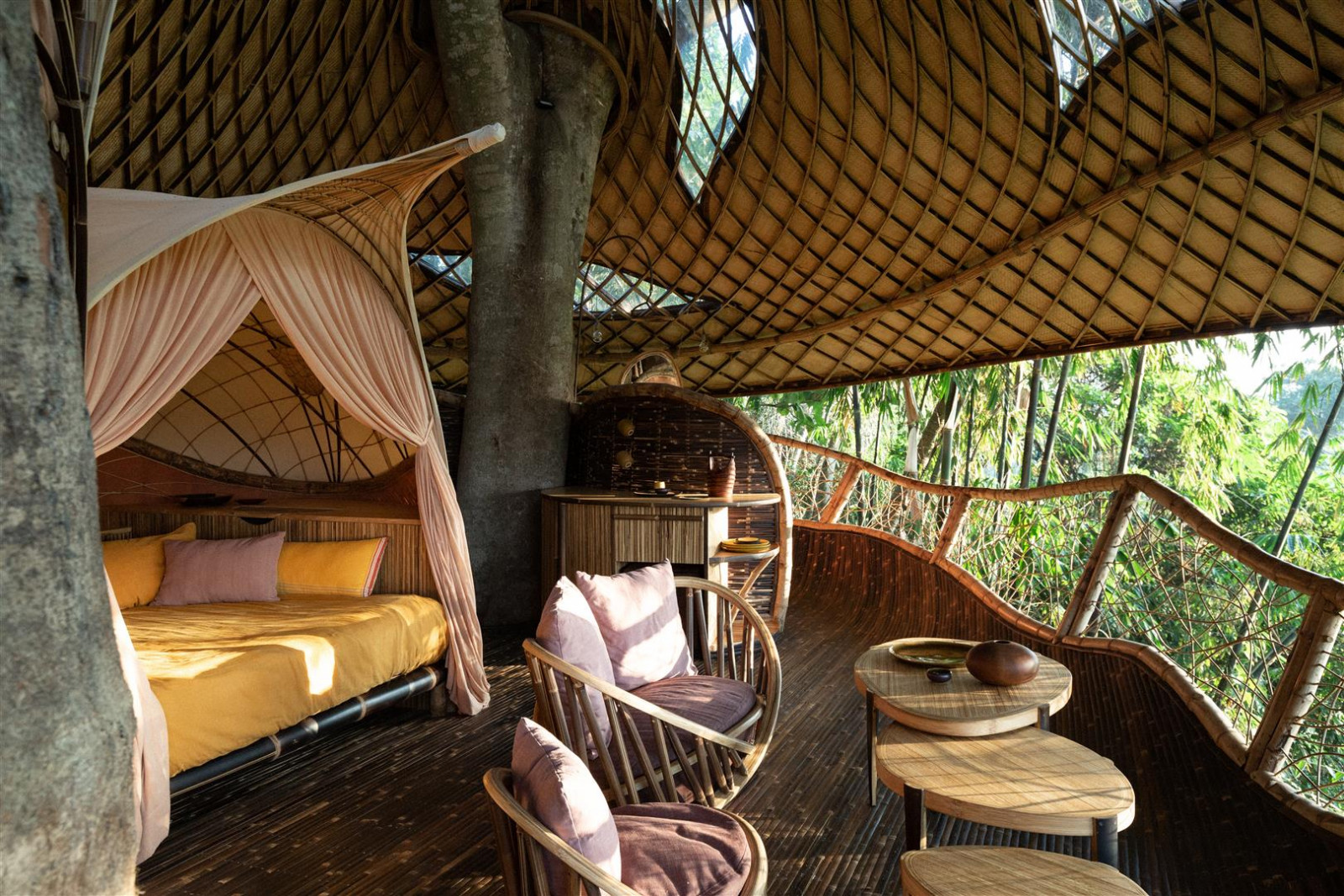 The Treehouse at Bambu Indah, with its bamboo lattice shell built around a living tree (Photo: Bambu Indah)