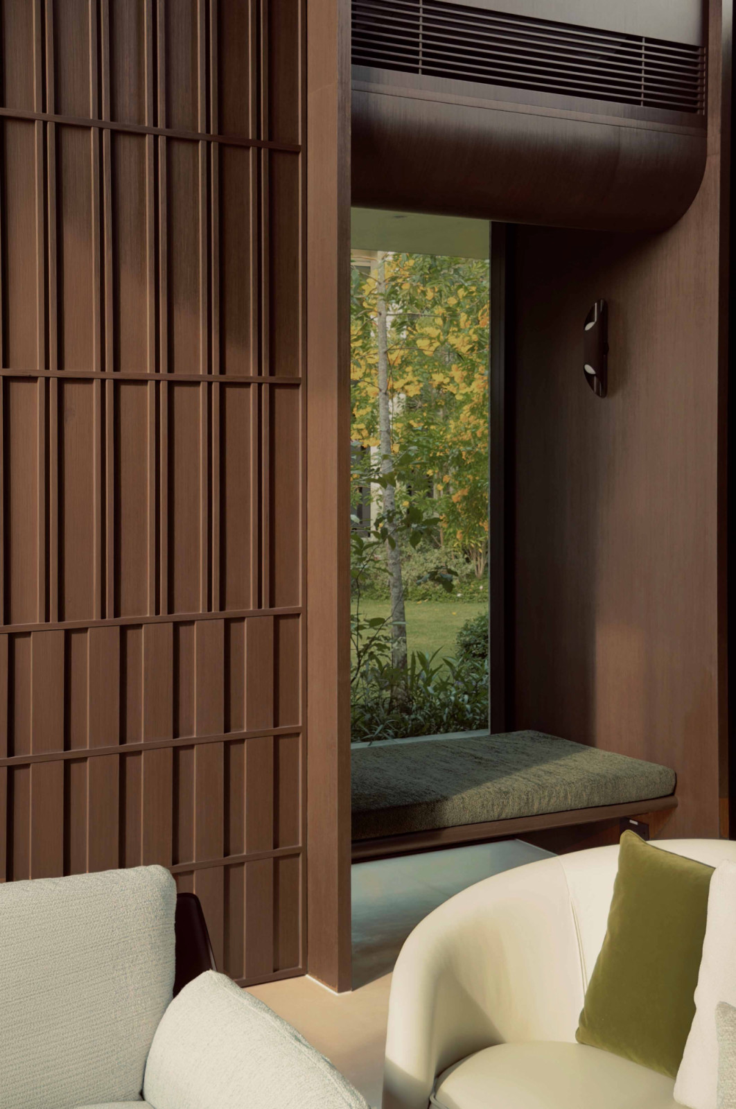 Tucked into the quietest corner of the house, the study pavilion, or “scholar studio”, looks out to a small bamboo and rock garden
