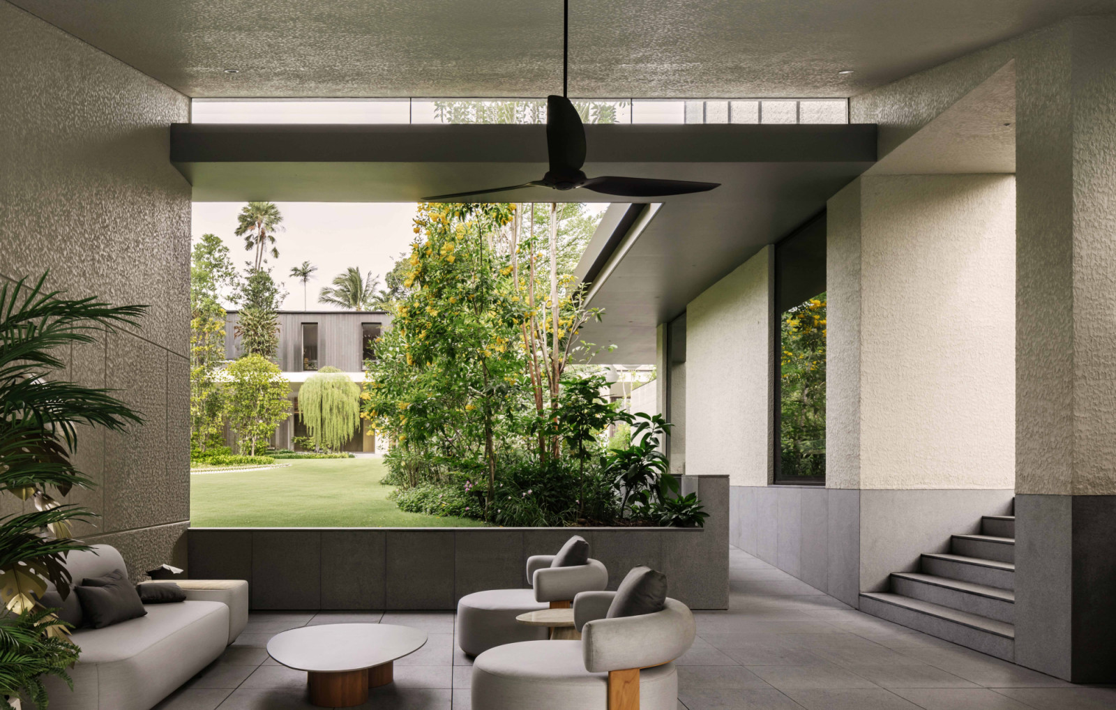 An open-sided pavilion frames the Good Class Bungalow’s central garden