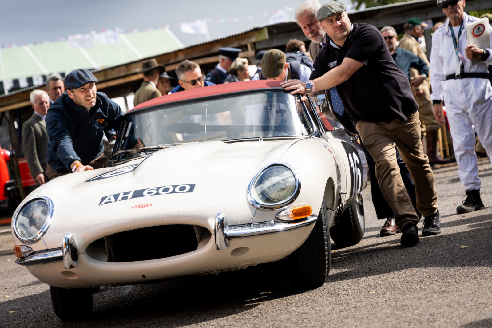 CHICHESTER, ENGLAND - SEPTEMBER 12: Cars are prepared in The Paddocks ahead of a race during Goodwood Revival 2025 at Goodwood Motor Circuit on September 12, 2025 in Chichester, England. (Photo by Tristan Fewings/Getty Images)