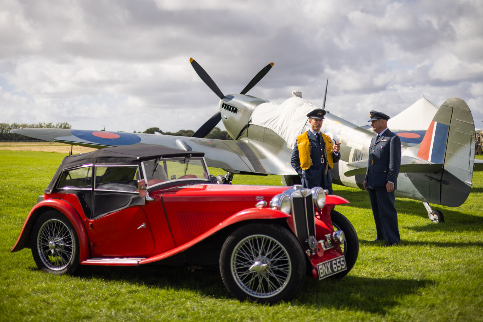 CHICHESTER, ENGLAND - SEPTEMBER 13: Re-enactors dressed in RAF uniforms take part in a display during Goodwood Revival 2025 at Goodwood Motor Circuit on September 13, 2025 in Chichester, England. (Photo by Tristan Fewings/Getty Images)