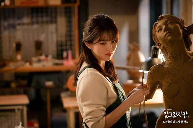 Han So-hee as soft-hearted art student Yoo Na-bi alongside Song Kang in the Netflix romance drama Nevertheless