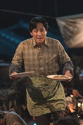 Park Hae-joon as the devoted lifelong partner Yang Gwan-sik in Netflix drama When Life Gives You Tangerines