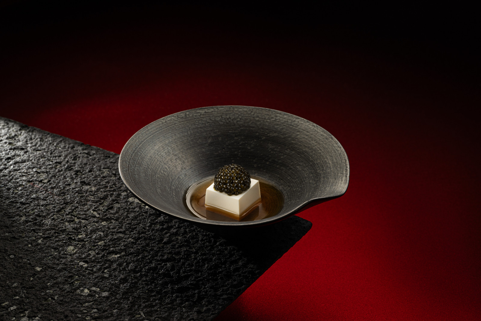 Oscietra caviar, soy cream, onion essence