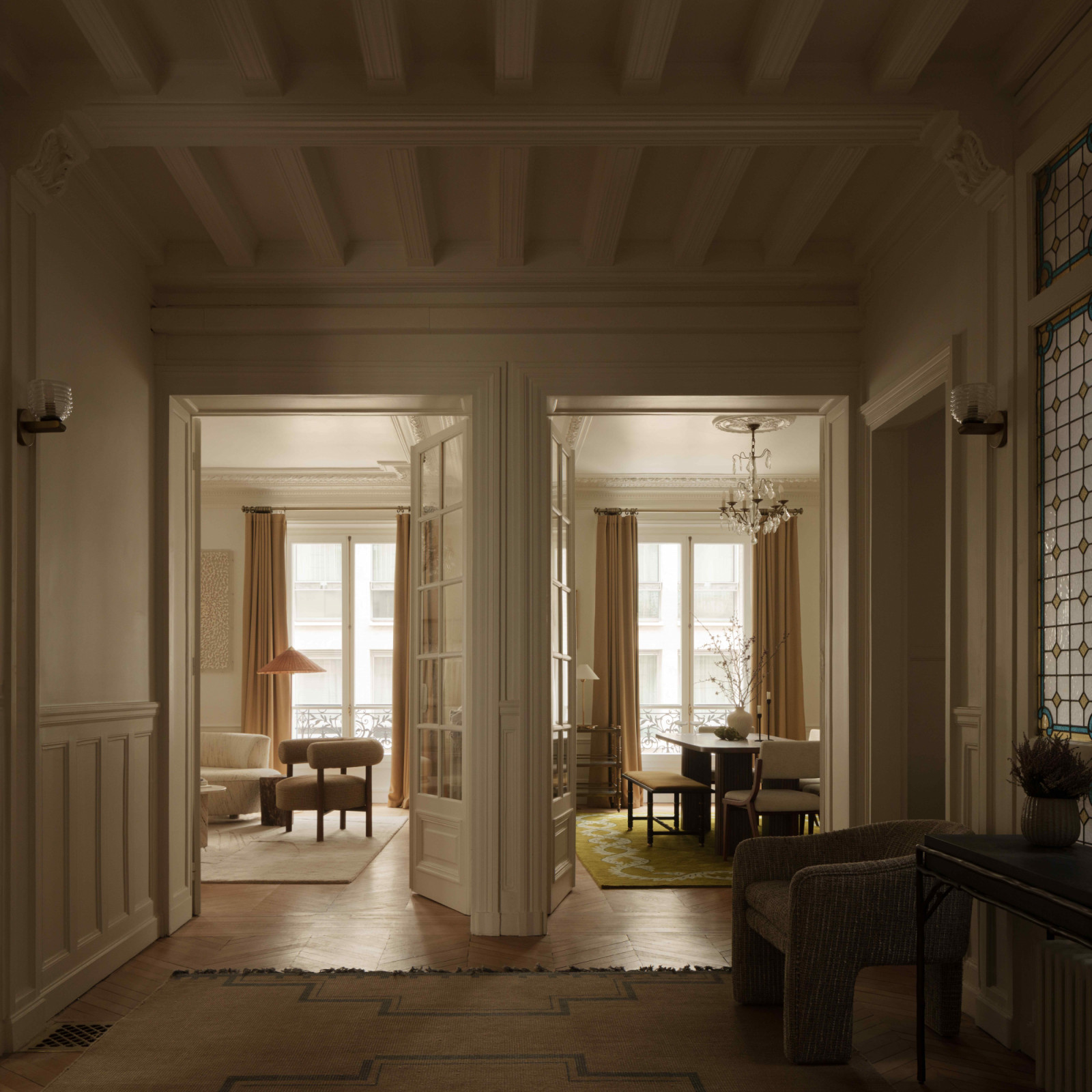 The apartment follows a fluid, interconnected floor plan
