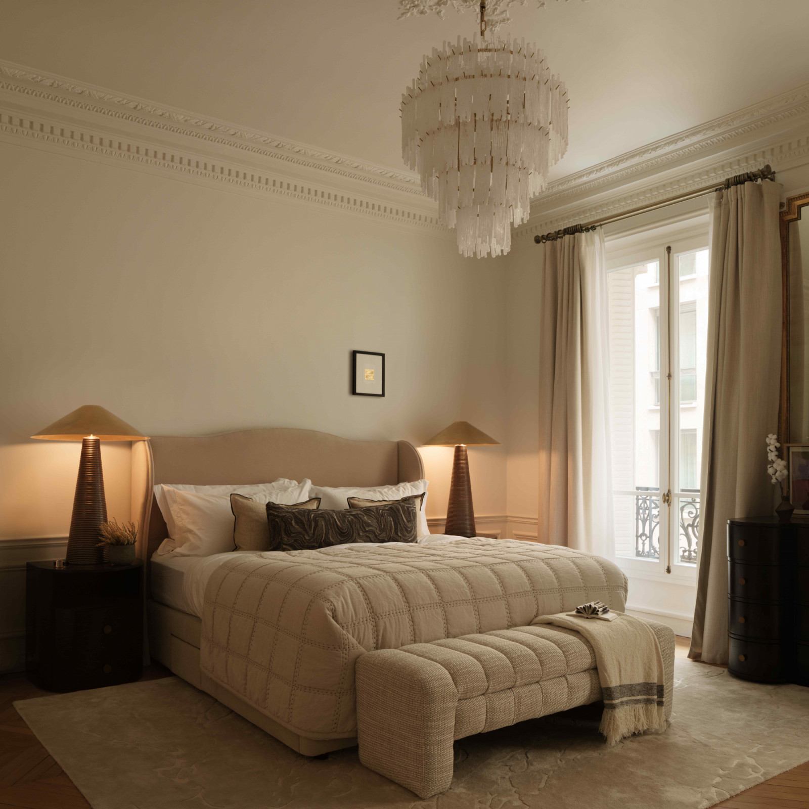 The main bedroom showcases materiality that reinforces the interiors’ collected, tactile quality