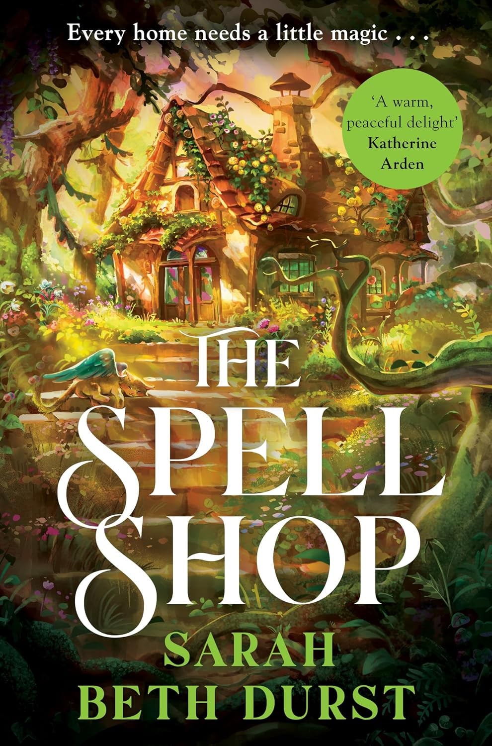 "The Spell Shop" by Sarah Beth Durst, a cosy fantasy novel featuring a magical cottage and a small winged creature.