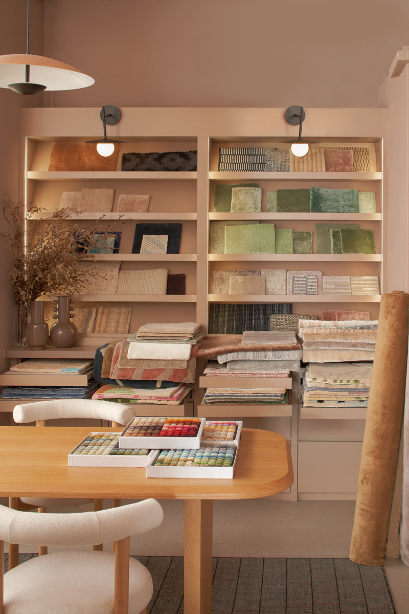 The material library and consultation corner at the Living DNA showroom, where the design team and clients sit down to discuss a piece