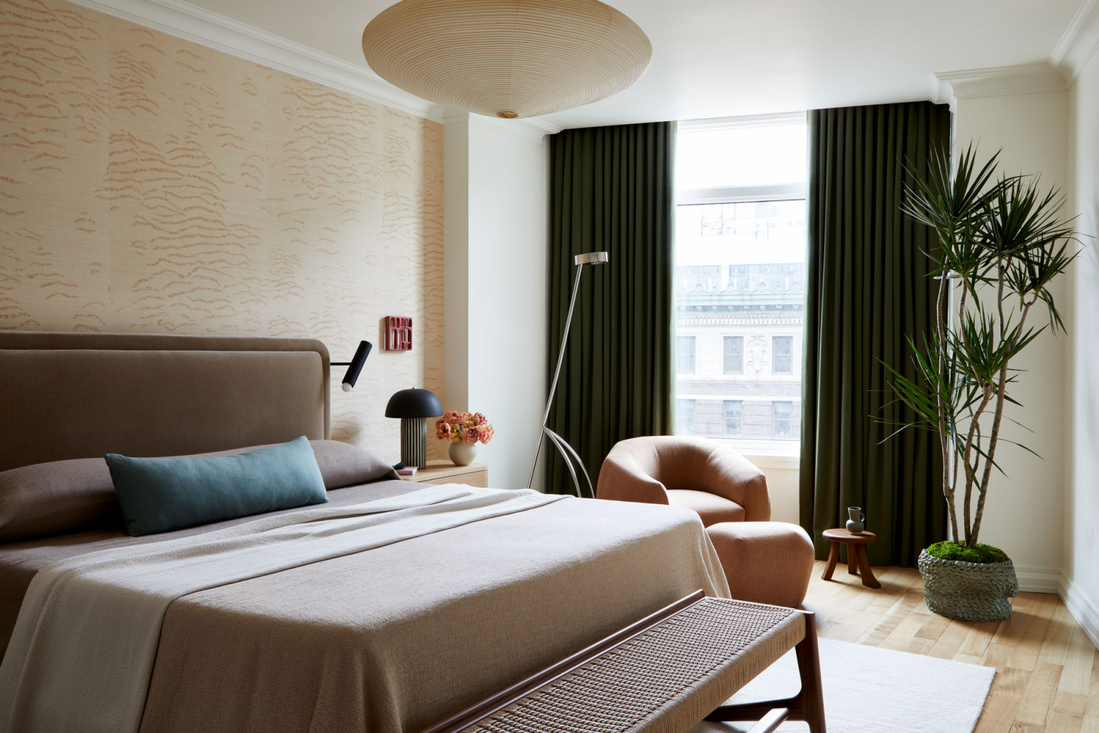 The primary bedroom of a family's New York City apartment by Rachel Sloane Interiors