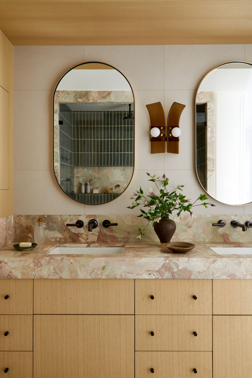 The ensuite bathroom of a family's New York City apartment by Rachel Sloane Interiors