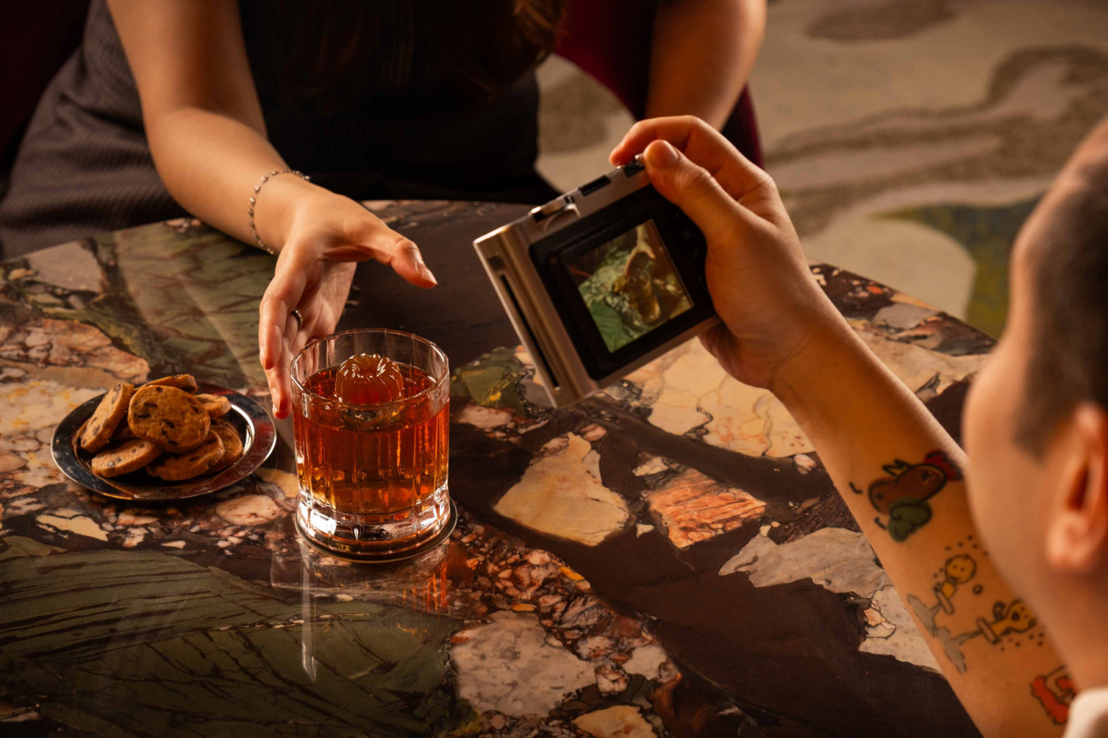 Reimagining the classic coffee-and-cookie pairing, Ritual features chocolate cookie-infused bourbon layered with peated whisky and salted maple for a distinctly modern finish