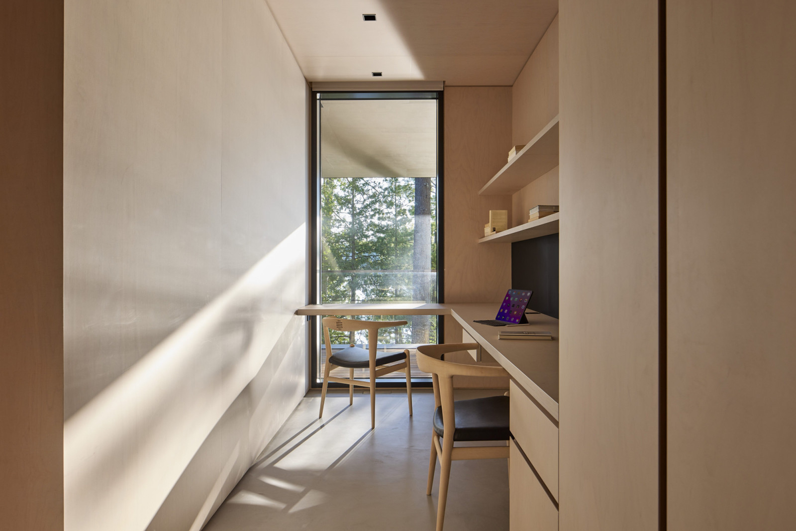 The interior walls and soffits use Canadian maple-veneered plywood