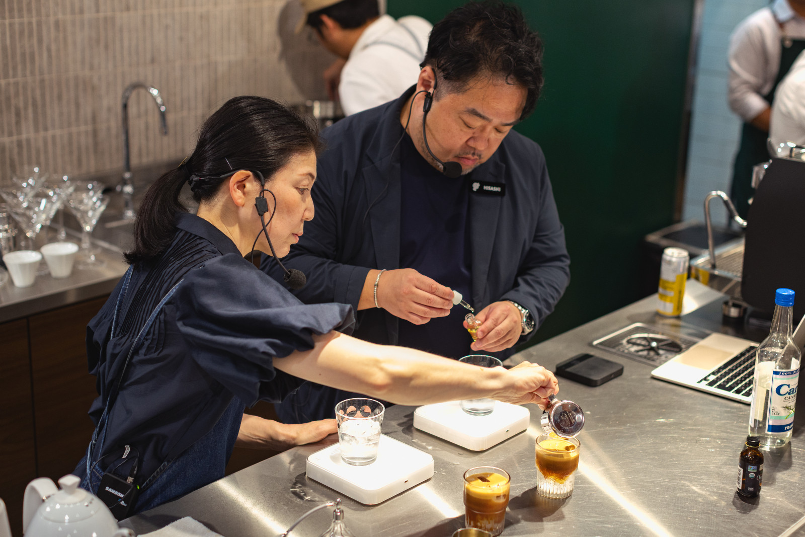 Tomoko and Hisashi prepare the signature tonic