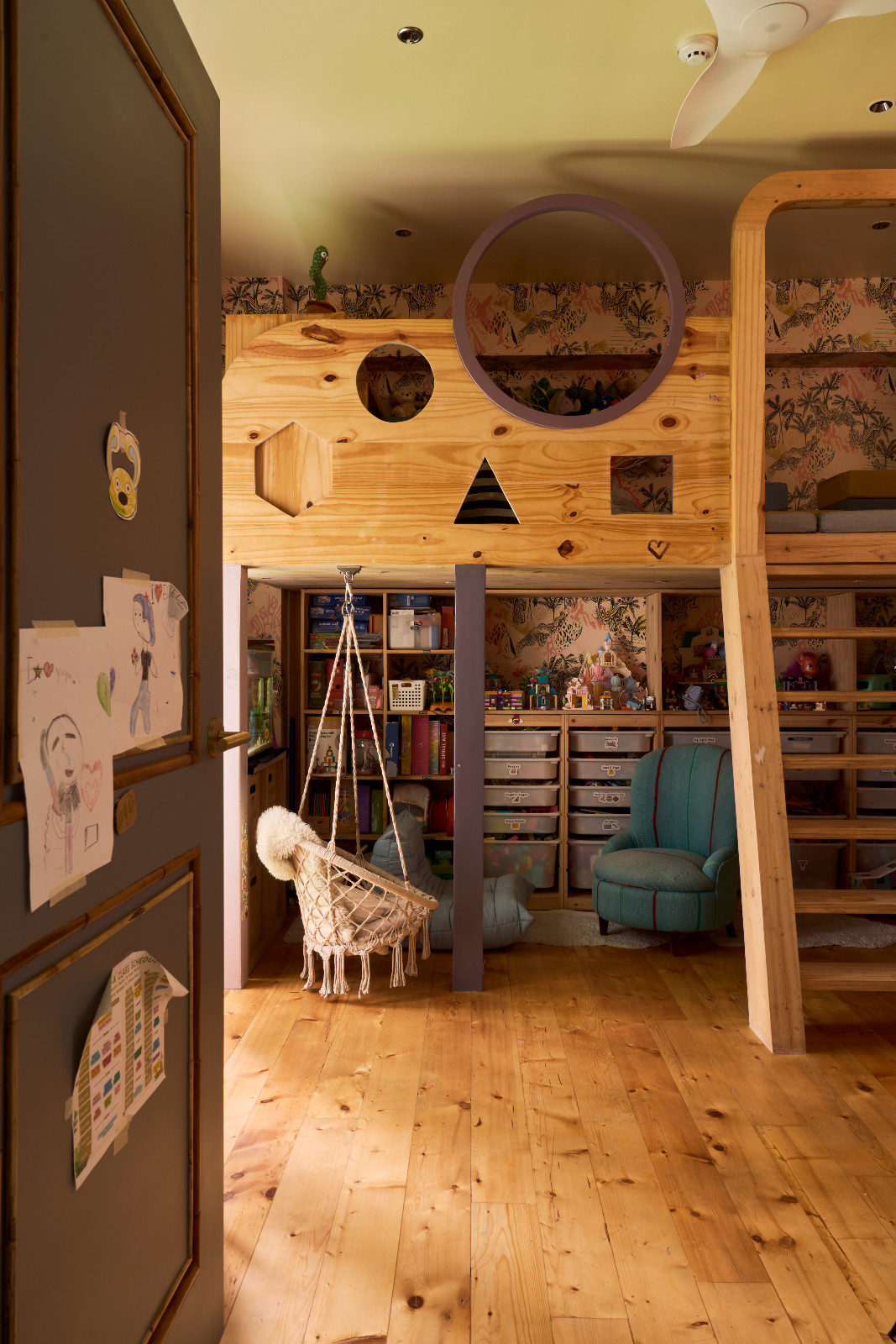 A little girl’s bedroom with a crocheted swing