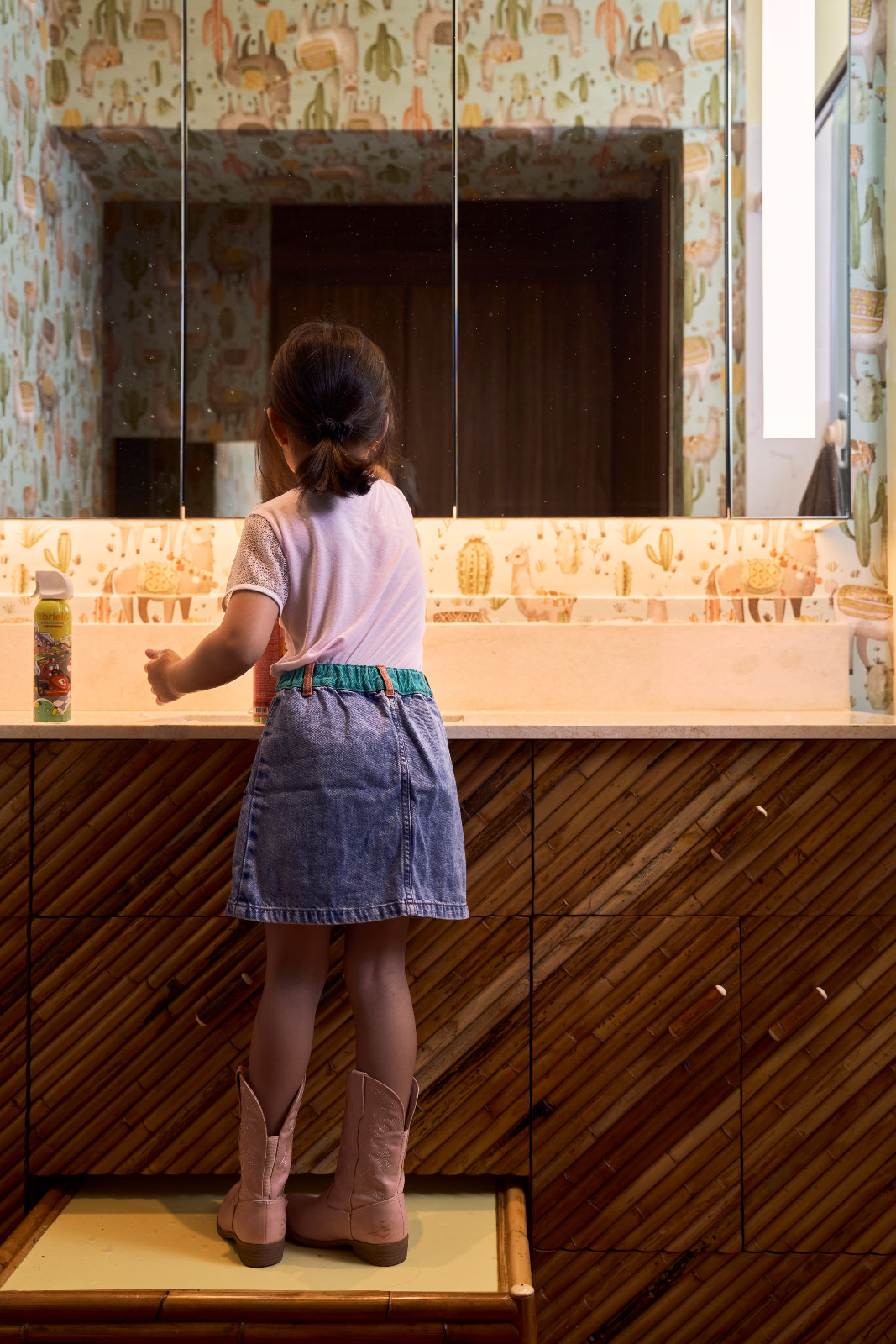 A pull-out step in the E. Murio-designed bathroom vanity perfectly encapsulates thoughtful details in the Manila home