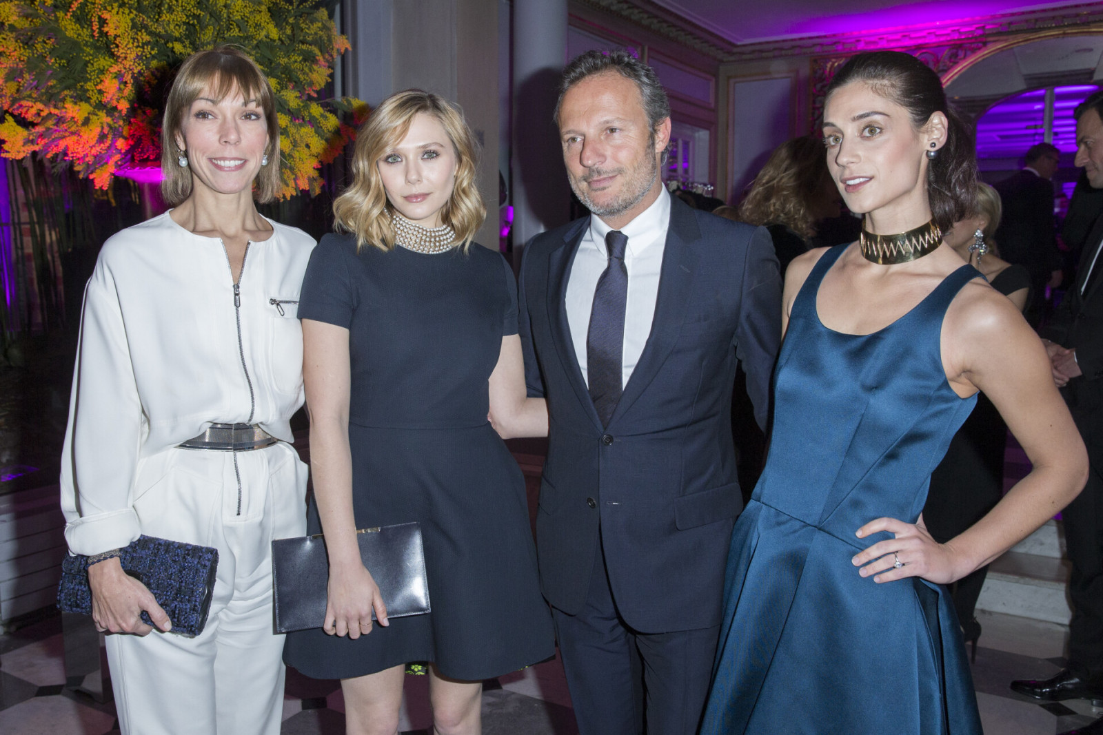 Mathilde Favier, Elizabeth Olsen, Olivier Bialobos et guest - Dîner de la mode pour le Sidaction au pavillon d'Armenonville à Paris le 29 janvier 2015.