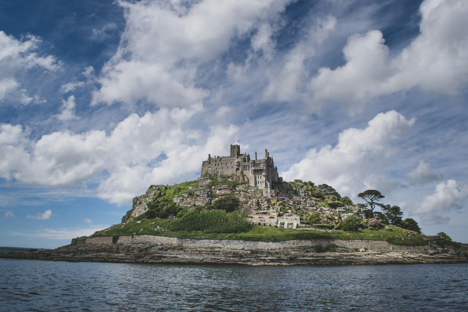 St Michael’s Mount seen from the water, its medieval castle and church crowning the tidal island above Mount’s Bay (Photo: Unsplash/Ben Elliot)