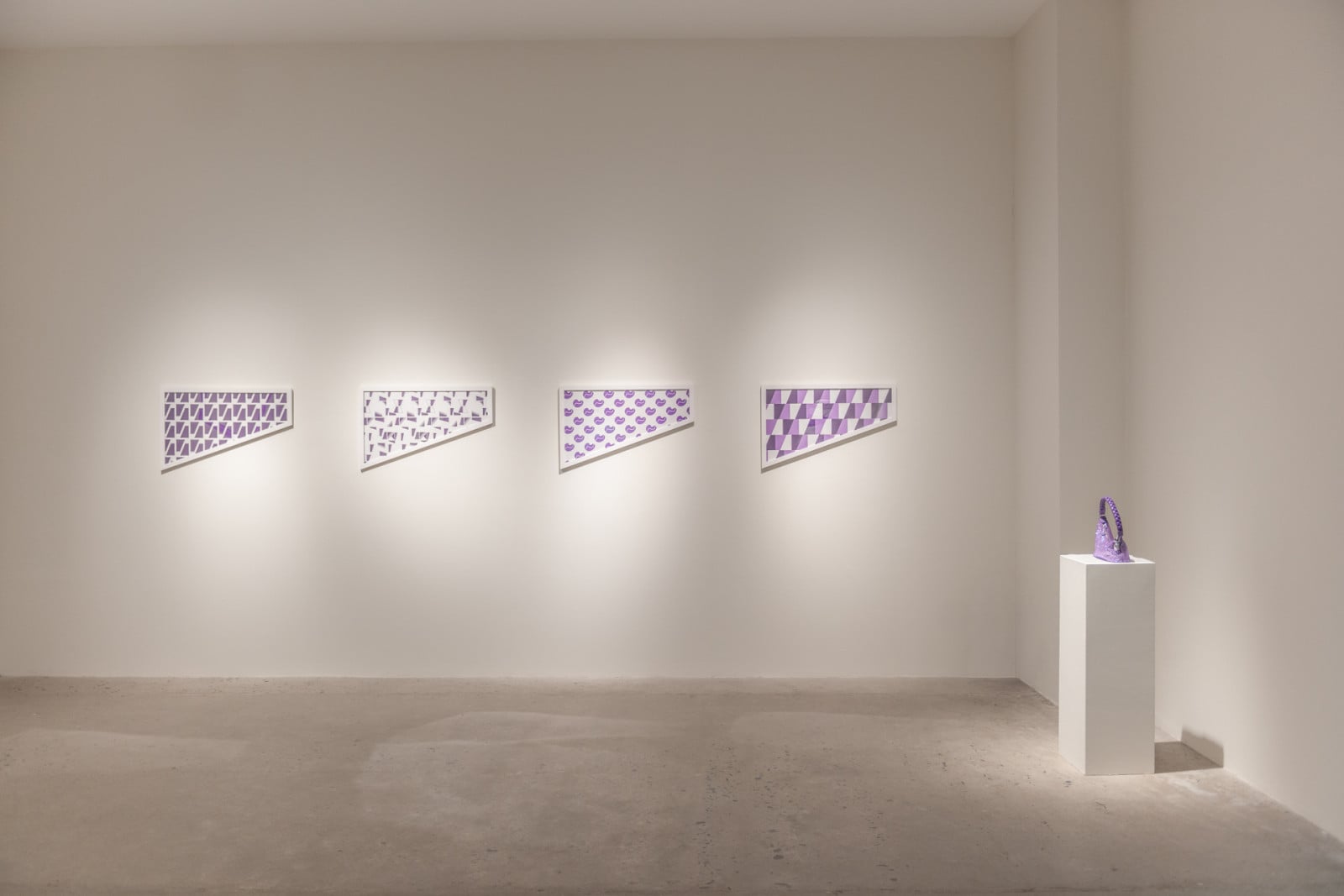 At the centre of the exhibit is Nicholas Tan’s Purpose bag, its silhouette stripped of its everyday function and reimagined across different forms (Photo: courtesy of 125 Projects)