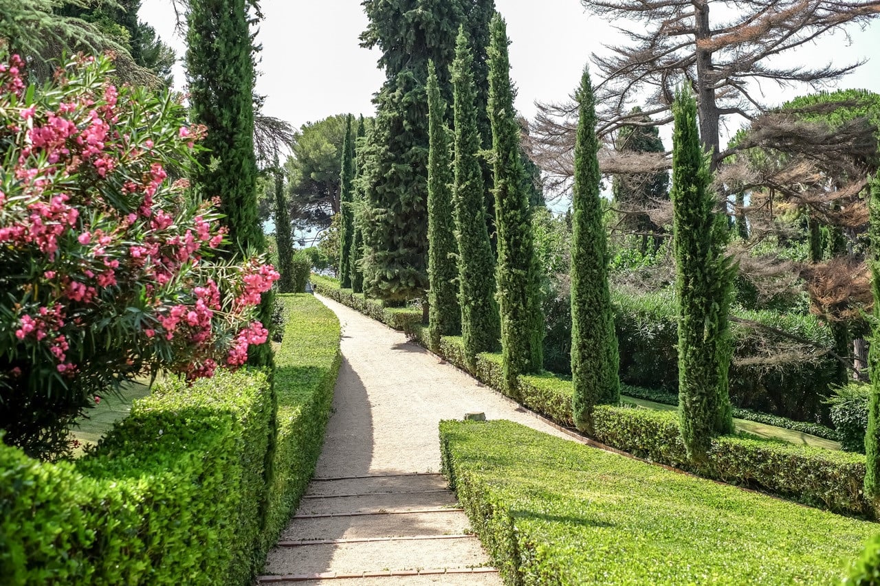 A cypress-lined path at the Gardens of Santa Clotilde in Lloret de Mar, laid out in 1919 by Catalan landscape architect Nicolau Rubió i Tudurí (Photo: iStock)