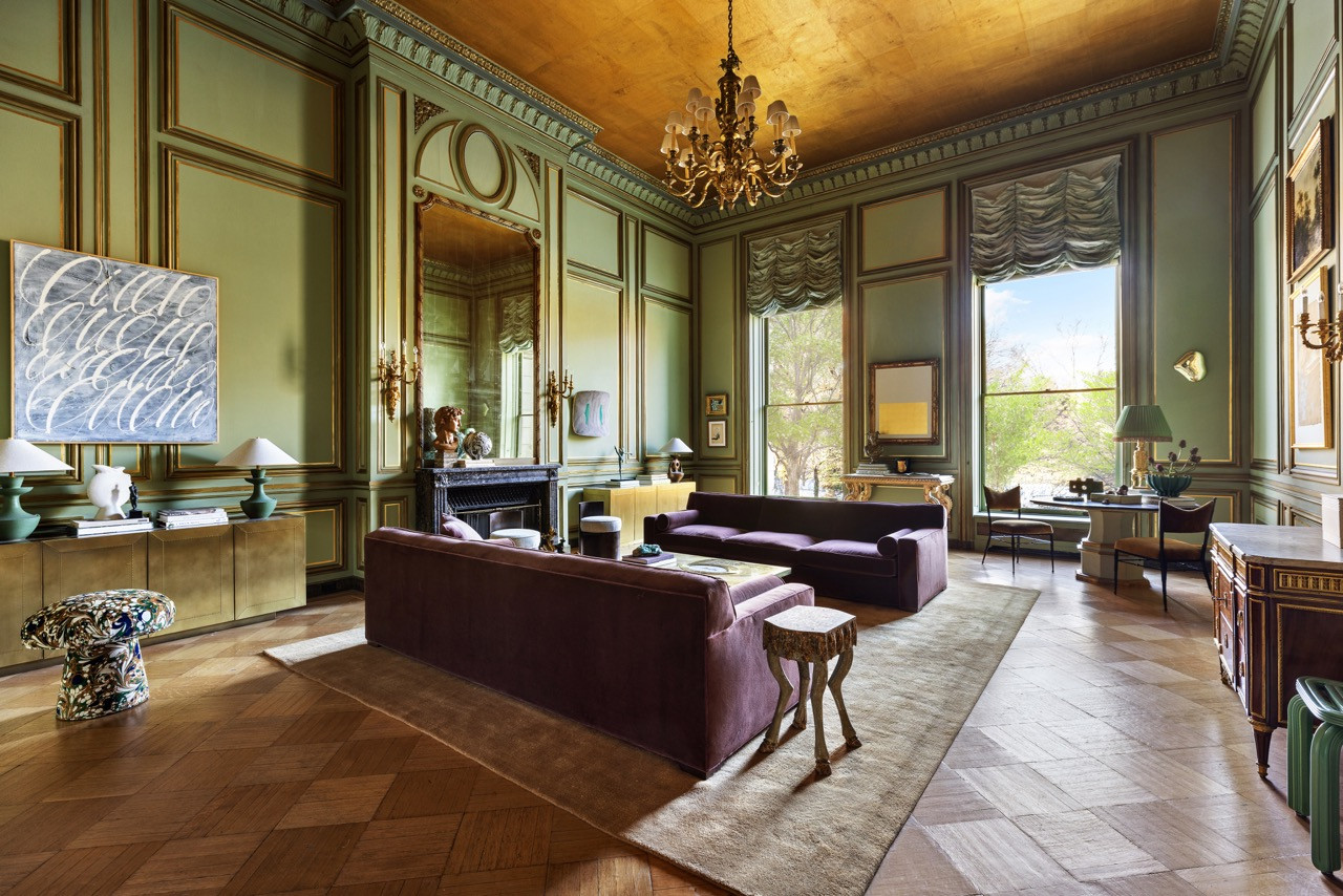 The Green Ballroom, its ceiling gilded and its walls left in their original green panelling, holds a mushroom-shaped ottoman upholstered in Beata Heuman fabric for Forsyth Art