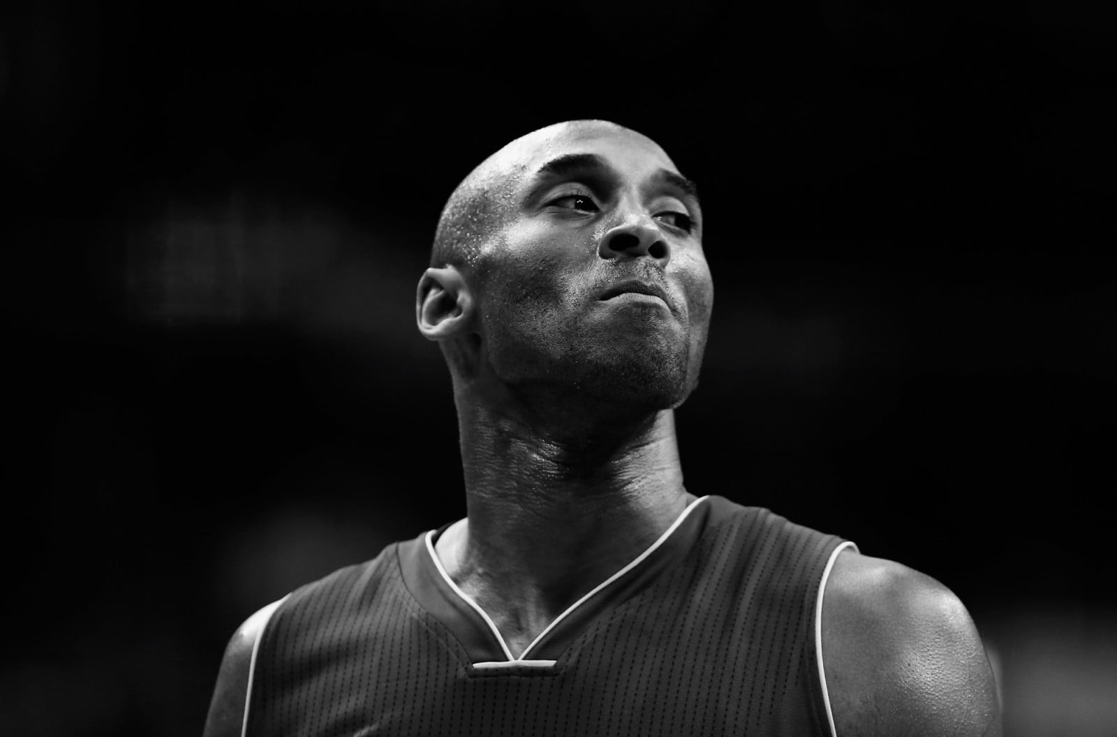 WASHINGTON, DC - DECEMBER 02: (Editors Note: Image has been converted to black and white) Kobe Bryant #24 of the Los Angeles Lakers looks on against the Washington Wizards in the first half at Verizon Center on December 2, 2015 in Washington, DC. NOTE TO USER: User expressly acknowledges and agrees that, by downloading and or using this photograph, User is consenting to the terms and conditions of the Getty Images License Agreement. (Photo by Rob Carr/Getty Images)