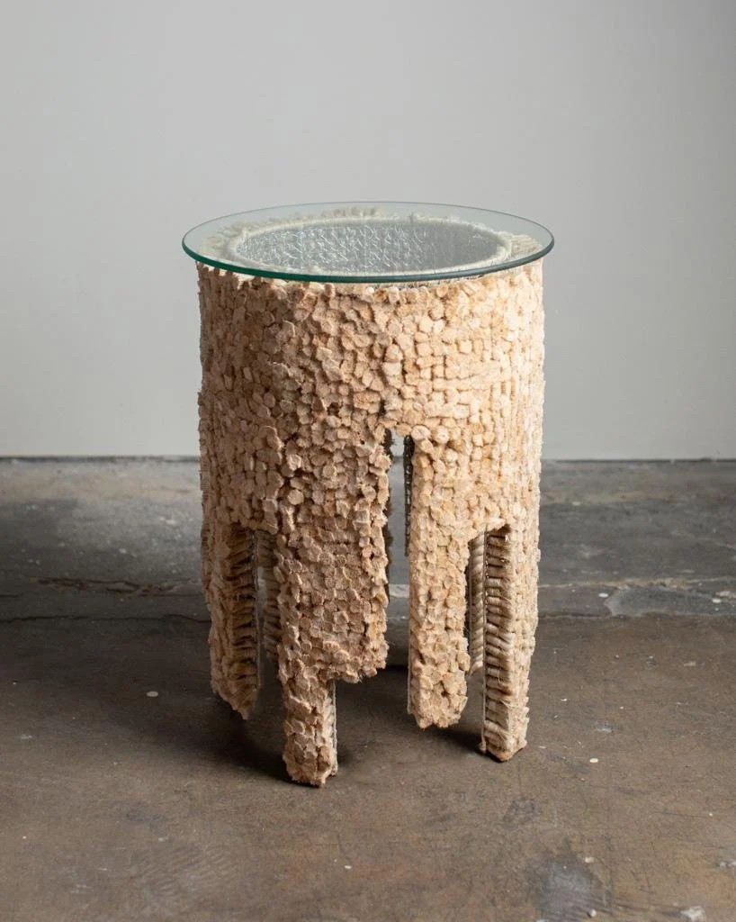 Apart from lighting, Brias designs furniture, this table is made with similar materials as the lights
