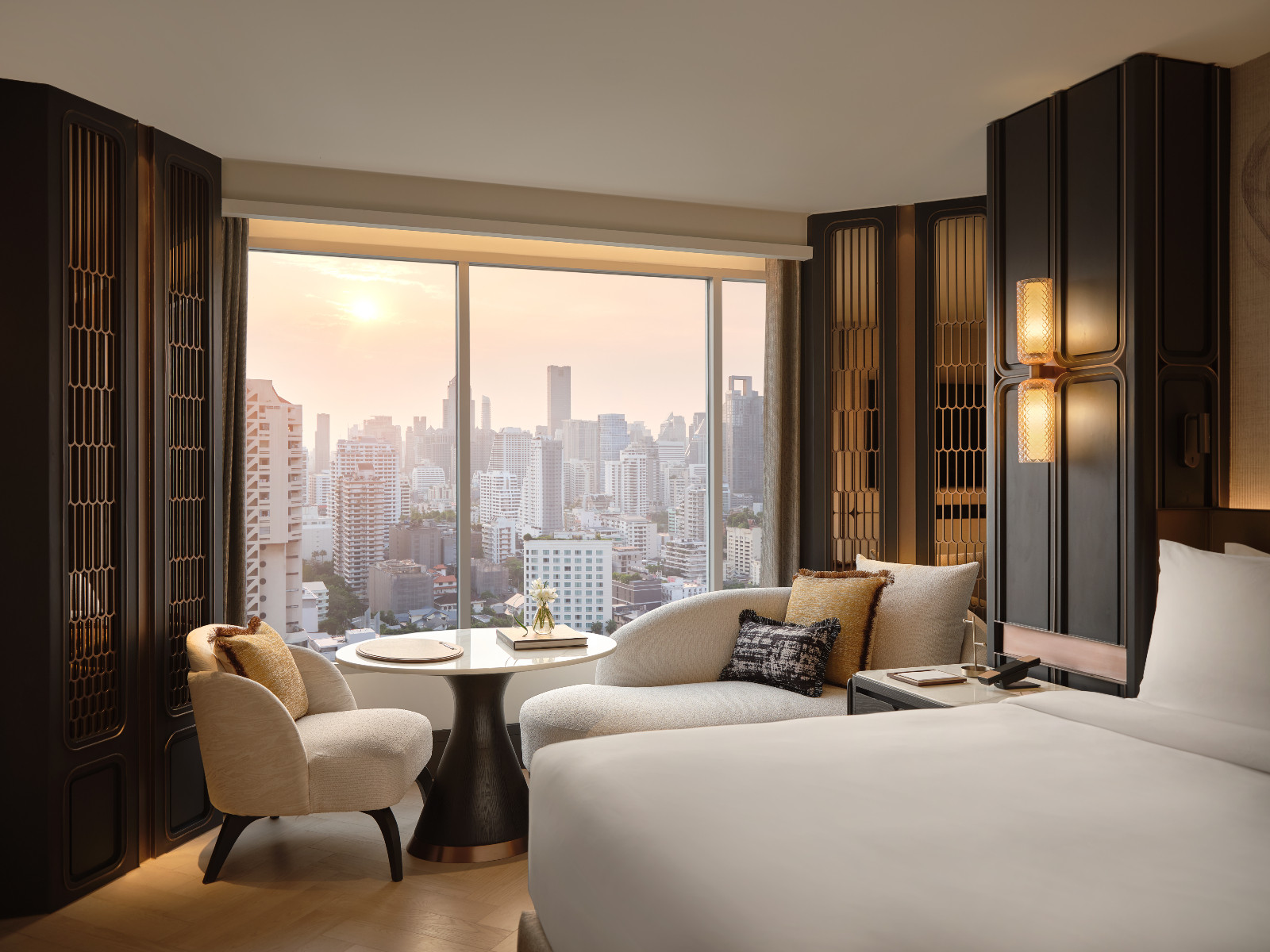 Designed by Bangkok practice PIA, guest rooms pair subtle botanical details with elegant residential comfort. (Photo: Fairmont Bangkok Sukhumvit)