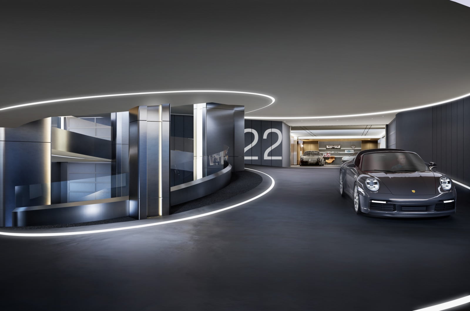 A private luxury garage showcases a modern Porsche convertible and other collectible vehicles, part of high-value real estate assets.