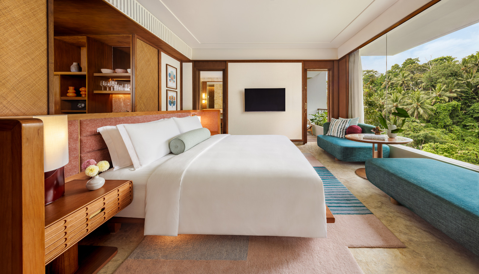 An essential room showcasing natural wood textures and views of the surrounding valley. (Photo: Kimpton Suntaya Bali Ubud)