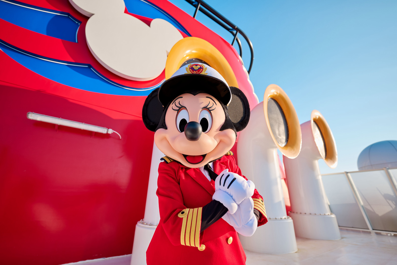 Minnie Mouse delights guests aboard the Disney Adventure, sharing smiles and creating unforgettable moments on the high seas. (Abigail Nilsson, photographer)