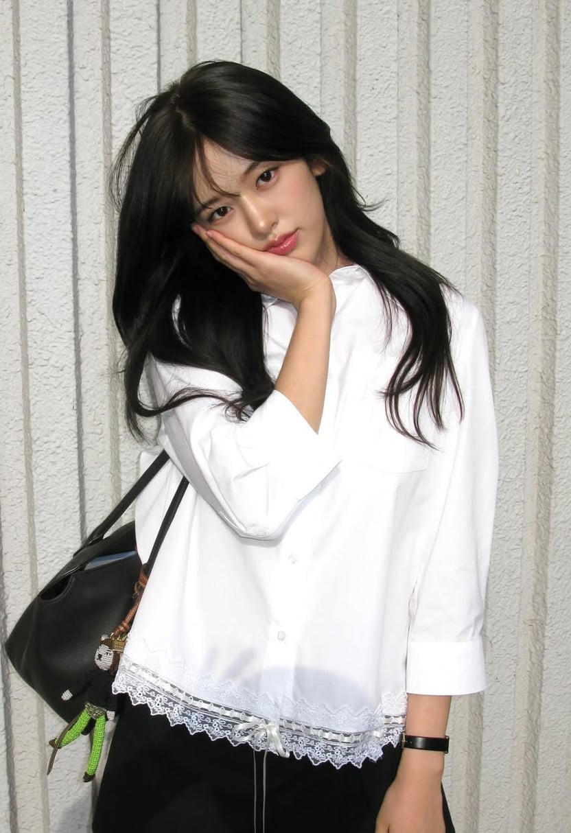 Ahn Yu-jin, leader of IVE, is pictured showcasing her signature style.