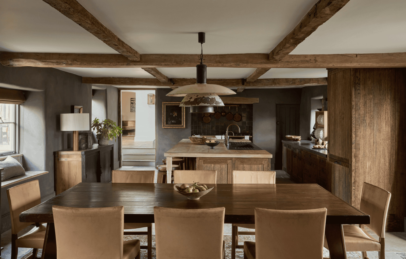 A Charles & Co. interior in the Cotswolds: reclaimed oak, exposed beams and a muted palette typical of Vicky Charles’s work (Photo: Instagram/@charlesandcostudio)