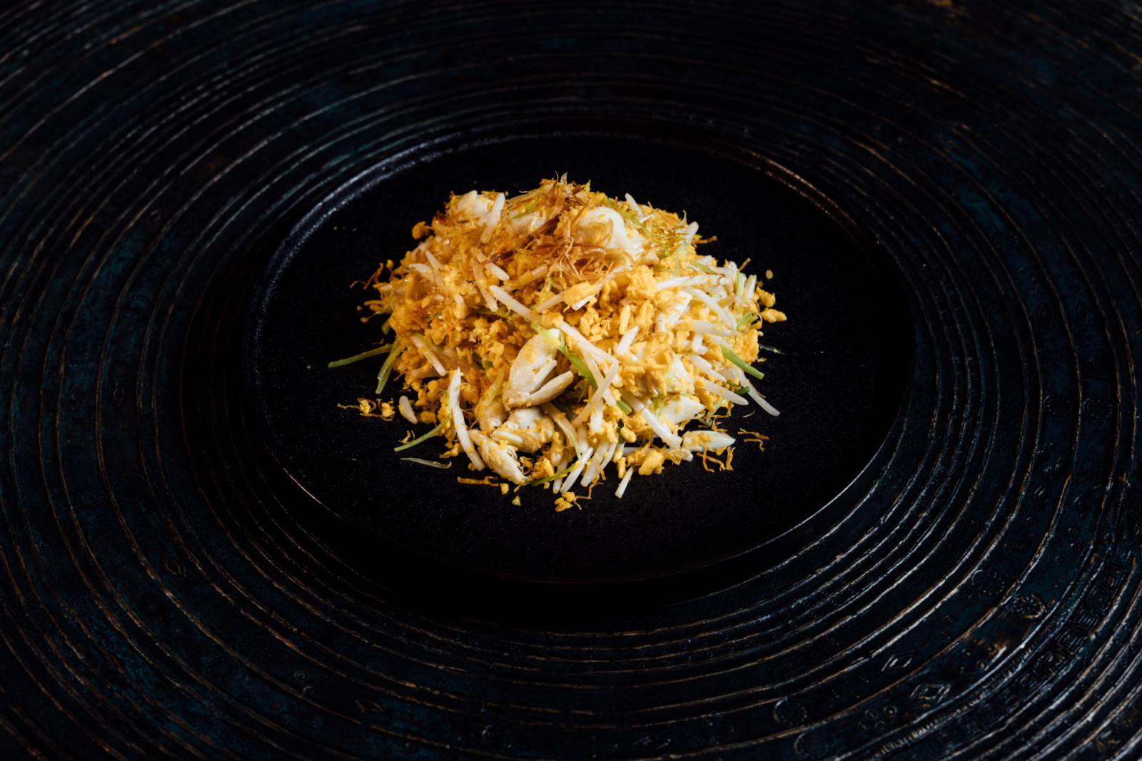 Osmanthus scrambled egg with dried scallop and crab meat at Mott 32 Cebu