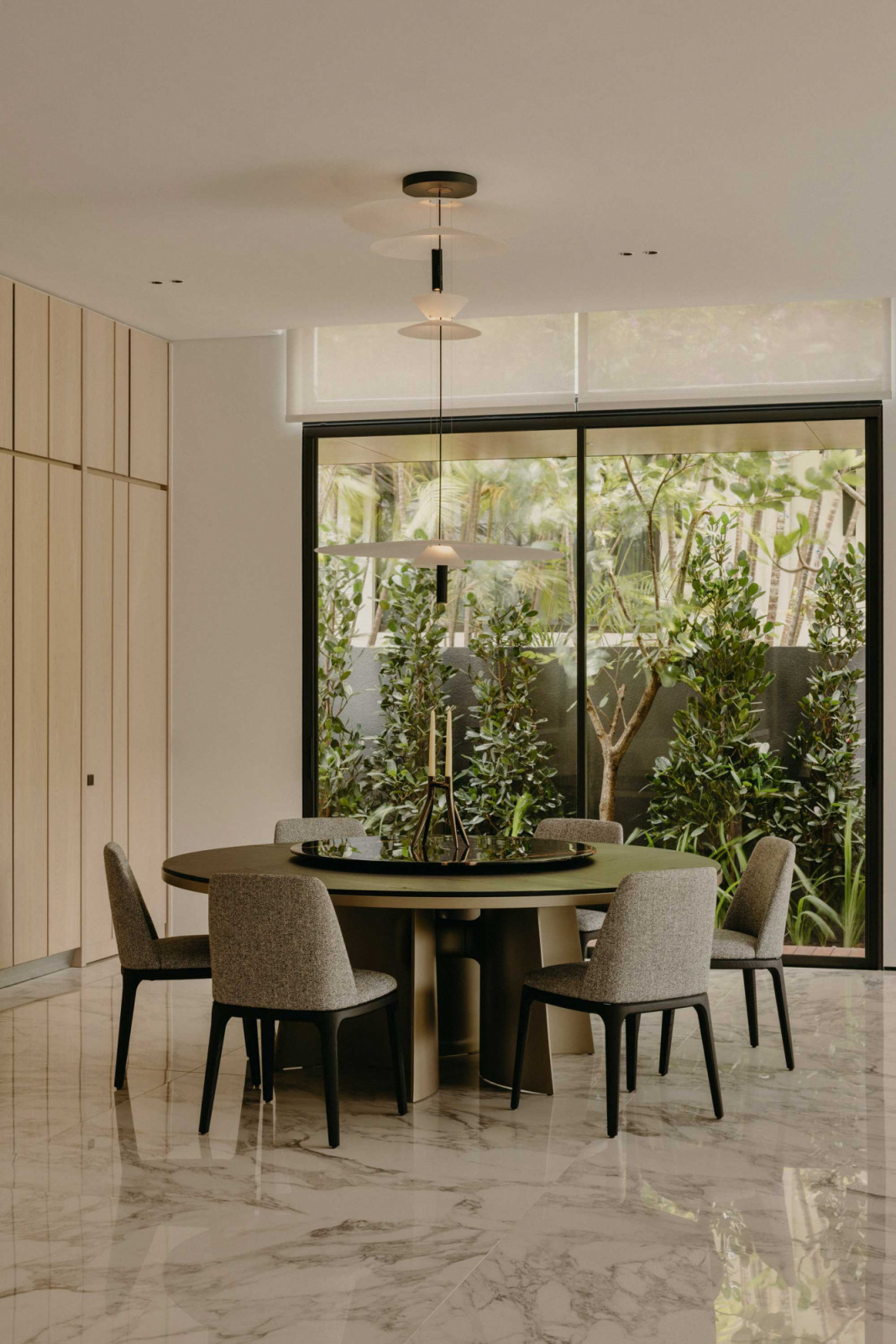 Low-emissivity glazing is used throughout the house to reduce heat gain while maintaining visual transparency