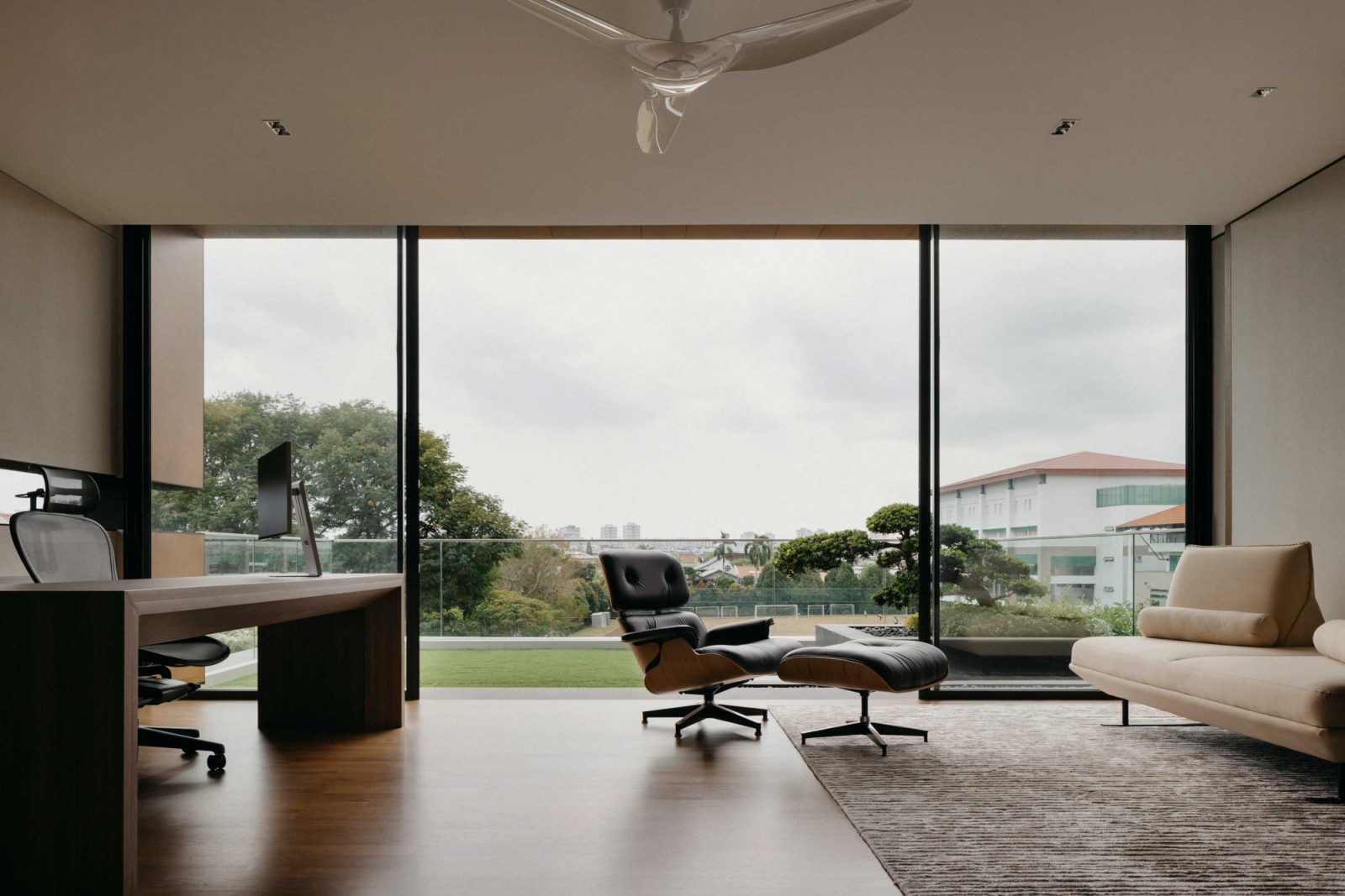 The stately study boasts an unfettered view of the neighbourhood