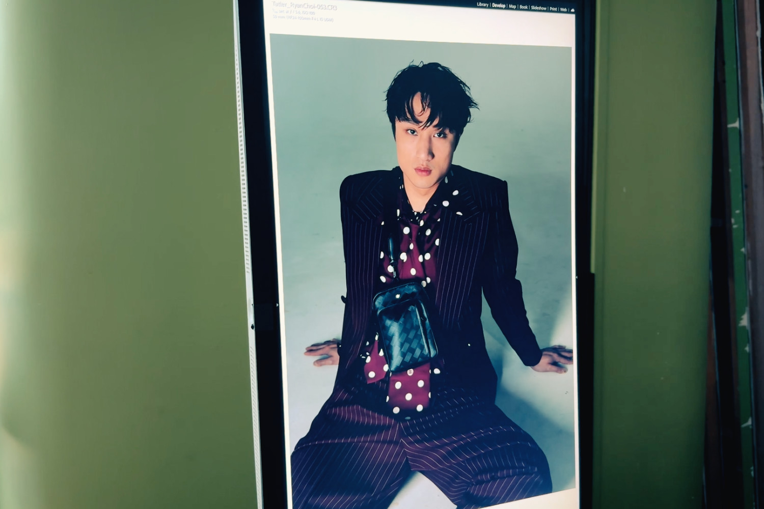 Fencer Ryan Choi being photographed for Hong Kong's Tatler Most Stylish cover
