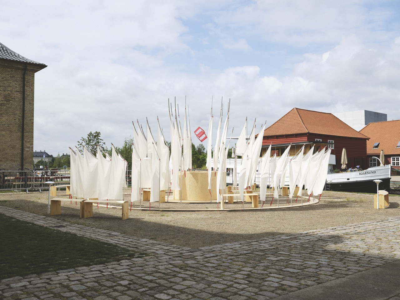 An installation by Penny for Louis Poulsen at Kuglegården, interpreted the three shades of the System PH through open construction and fabric