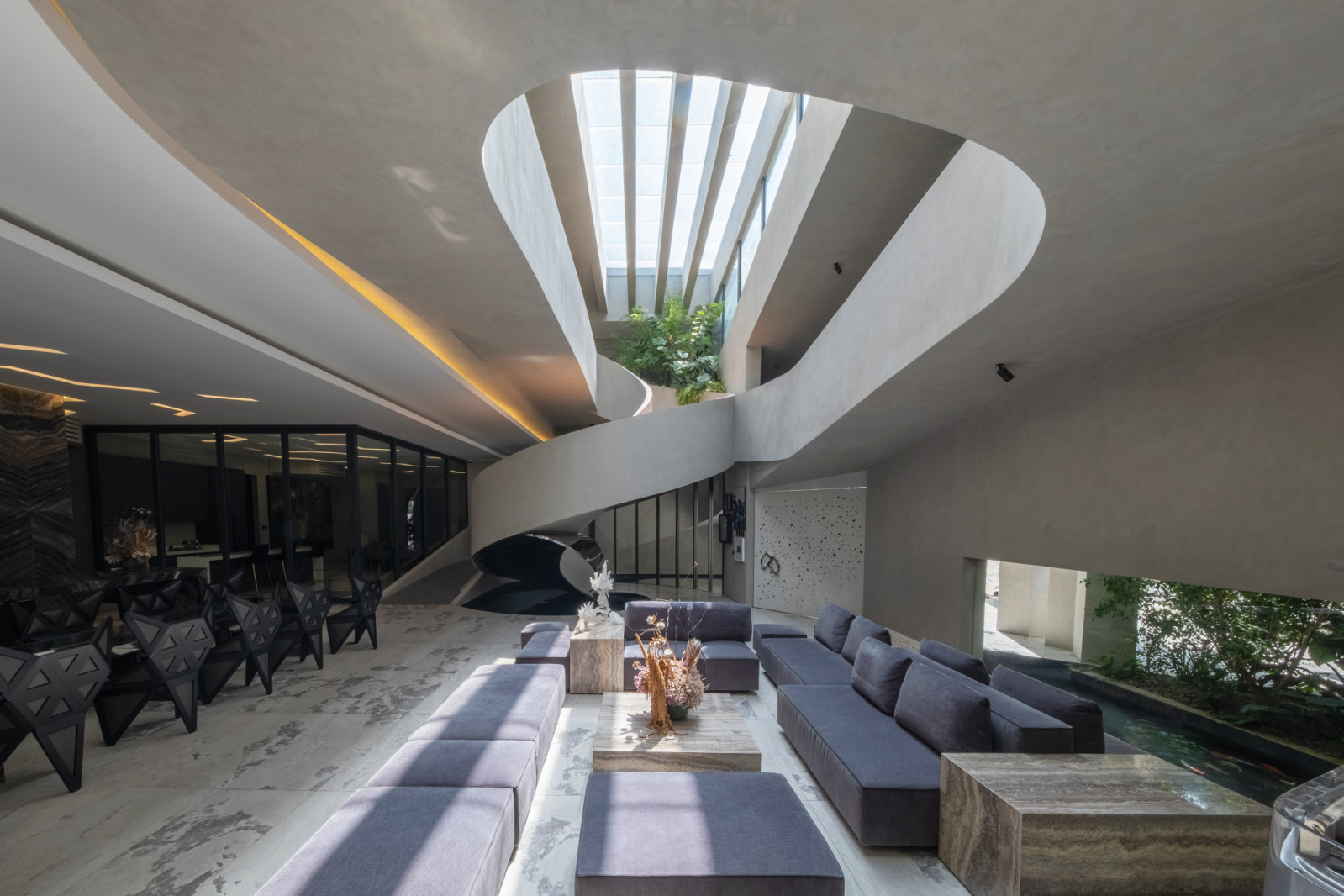The fluid transition between living and dining areas creates an inviting, host-friendly layout