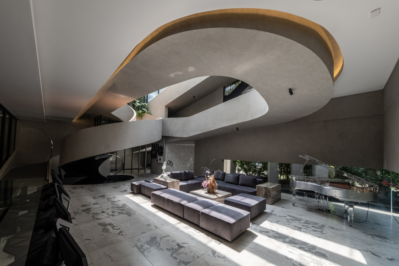 Every element of the living space in this home designed by Carlo Calma was crafted to encourage effortless movement and conversation