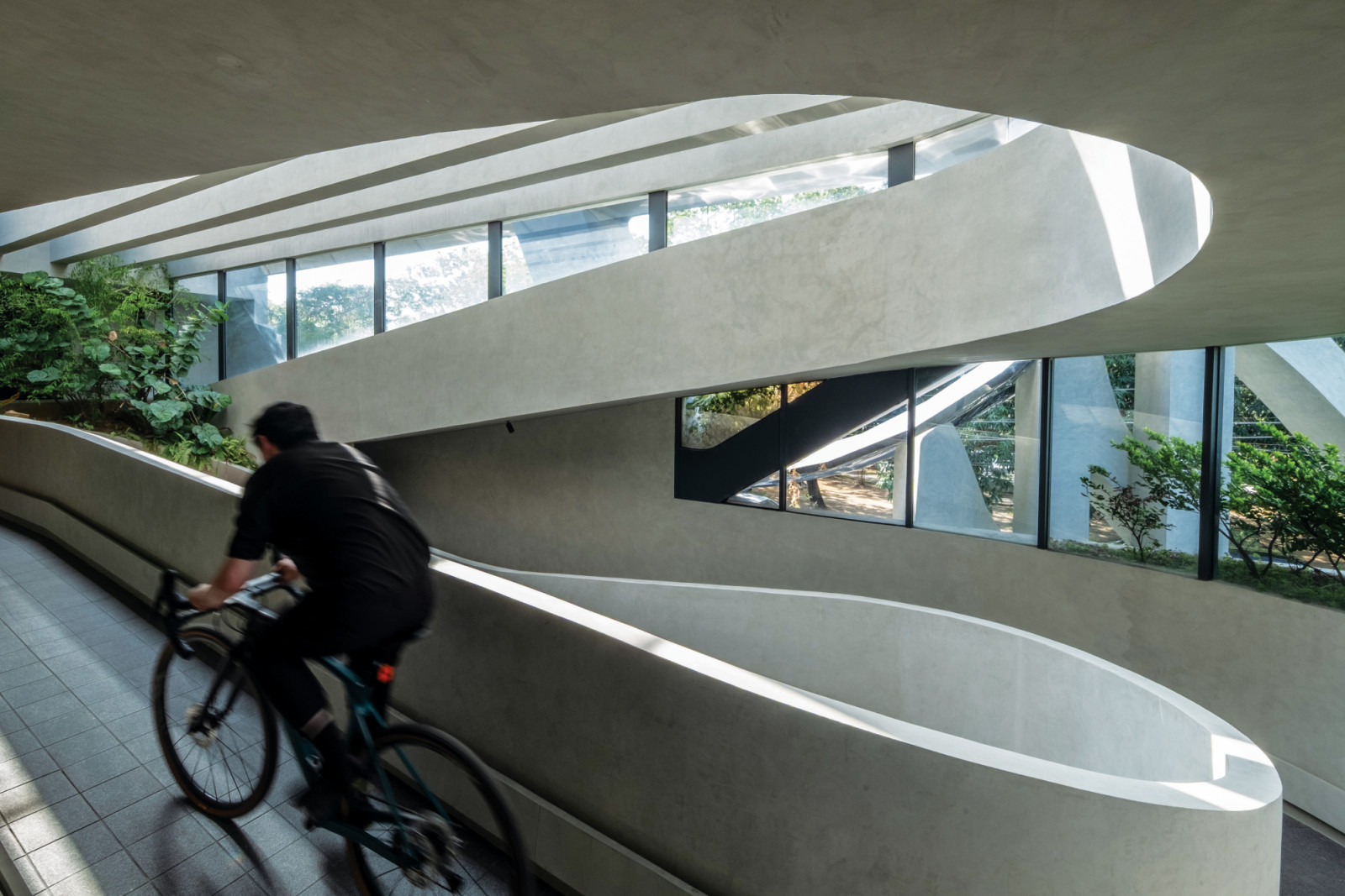 Built for the ride, the Loop House’s centrepiece is the wraparound exterior ramps that create a seamless daily cycling loop for one of the owners