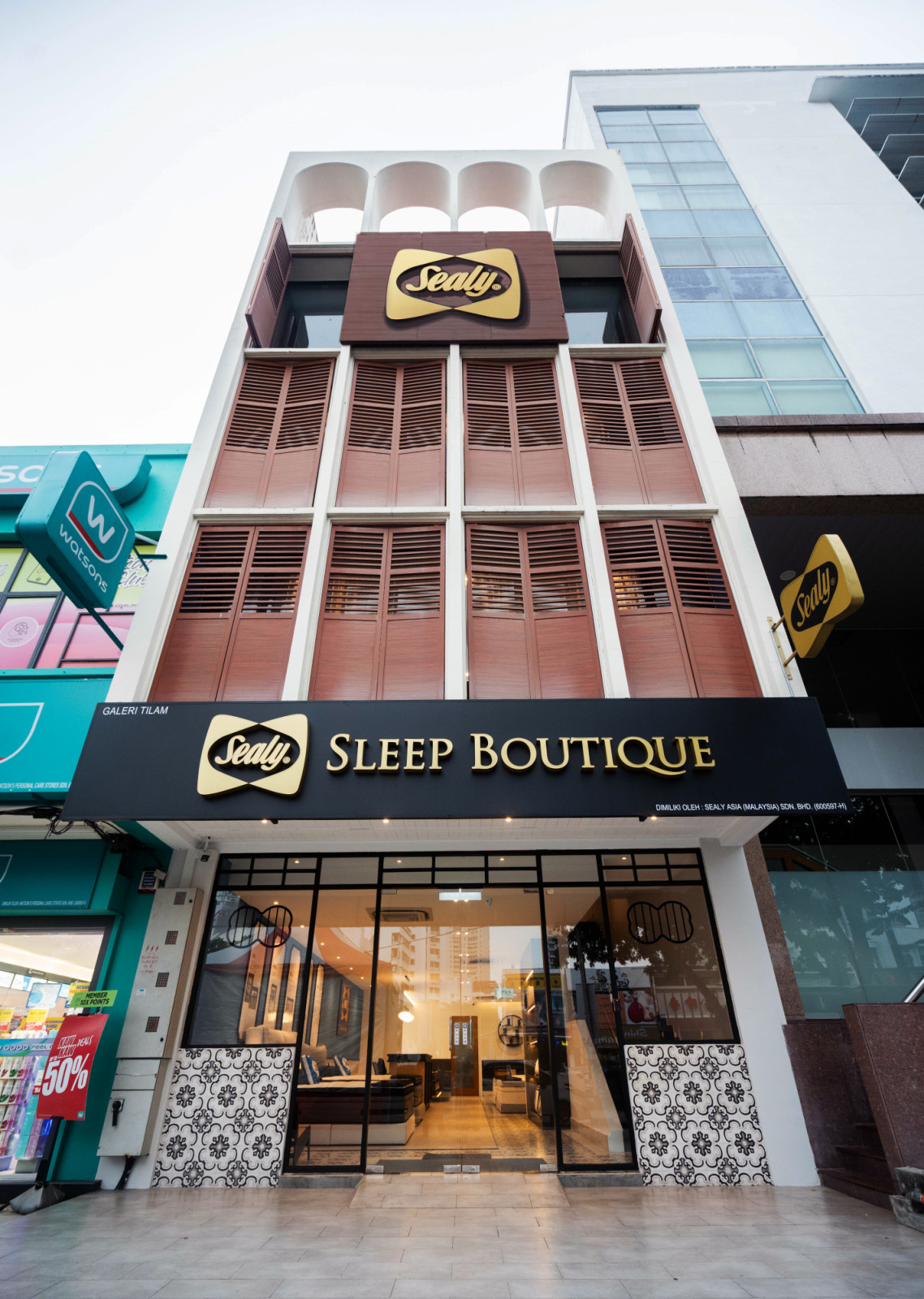 The boutique’s façade on Burmah Road, with its tropical-colonial shutters and gold signage, marks Georgetown’s newest sleep destination