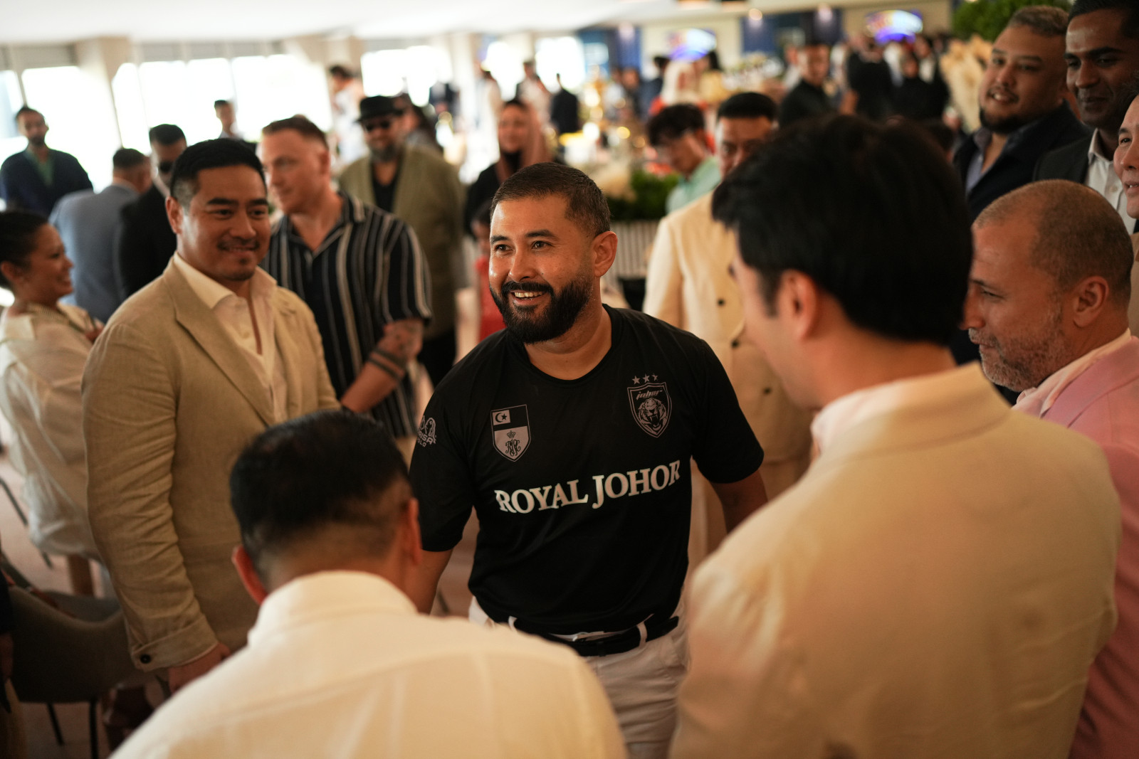 HRH Tunku Mahkota Ismail receiving a warm reception at the Royal Pavilion viewing deck