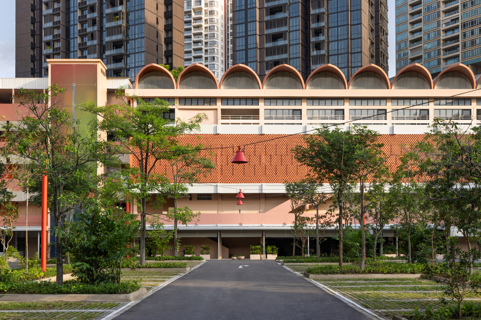 A brutalist structure, the School Block facade at New Bahru retains its original mid-century breeze blocks and panels for an eye-catching design