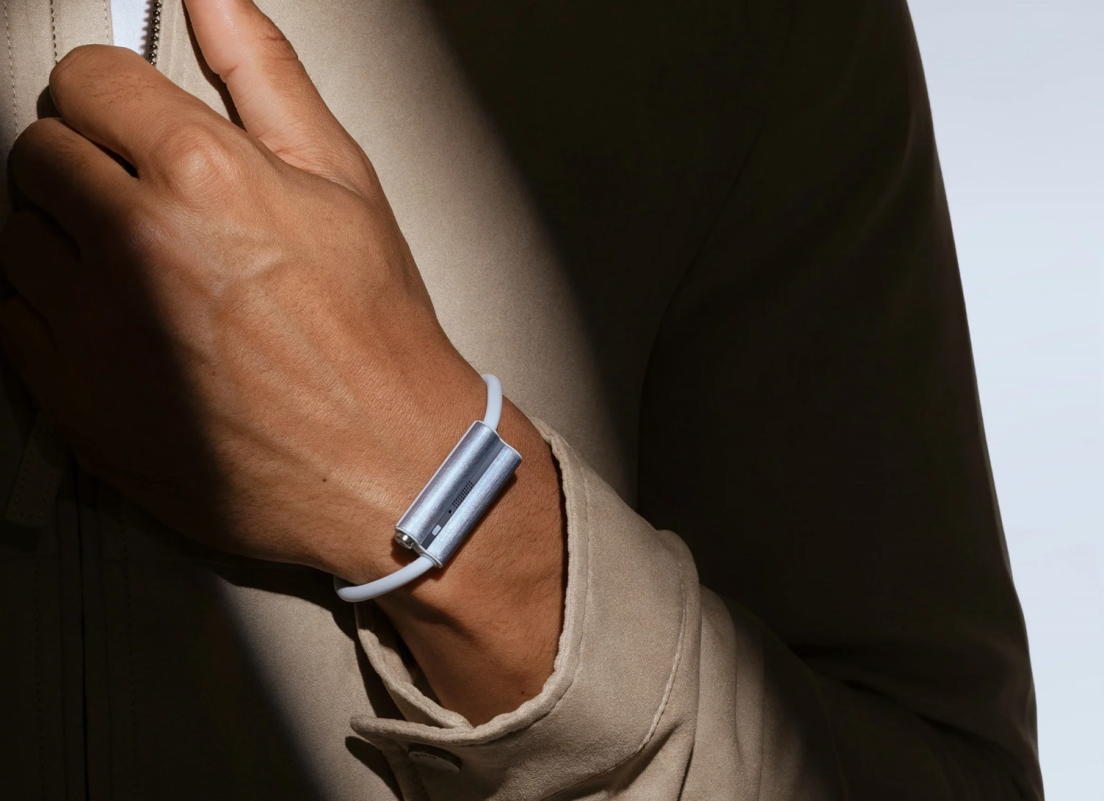 A minimalist wearable device offers discreet functionality on the wrist.