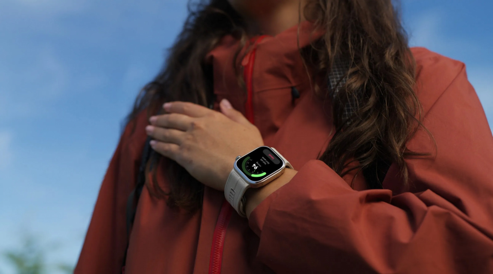 An Apple Watch Ultra monitors health metrics from a user's wrist, demonstrating the power of current wearables.